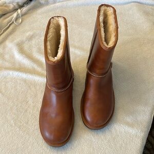Uggs short leather boots, size 9. New-never worn.